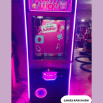 Coin operated claw machine
